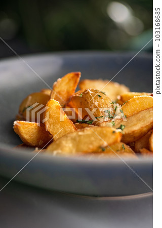 Potato country style with dill in bowl. Healthy diet food. copy space. Potato country style with dill in bowl. Healthy diet food. copy space. 103168685