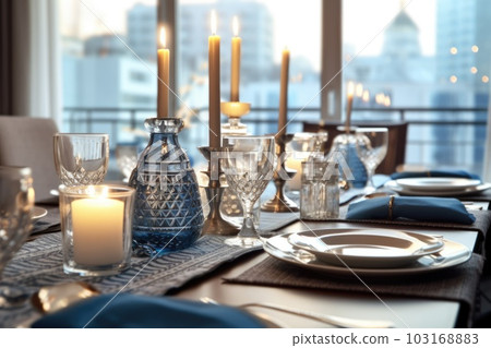 Romantic table setting with candles and flowers Romantic table setting with candles and flowers 103168883