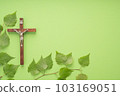 Christian Pentecost. Whit Sunday. A cross with a birch branch on a white, green, red and black background. 103169051