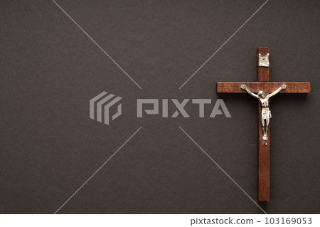 Christian Pentecost. Whit Sunday. A cross with a birch branch on a white, green, red and black background. 103169053
