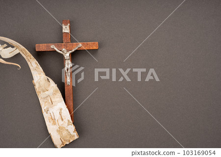 Christian Pentecost. Whit Sunday. A cross with a birch branch on a white, green, red and black background. 103169054