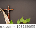 Christian Pentecost. Whit Sunday. A cross with a birch branch on a white, green, red and black background. 103169055