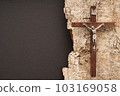Christian Pentecost. Whit Sunday. A cross with a birch branch on a white, green, red and black background. 103169058