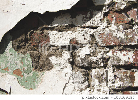 Texture of an old stone with a crack. Grunge brick texture. Texture of an old stone with a crack. Grunge brick texture. 103169185