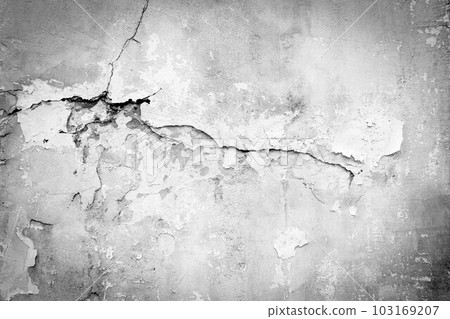 Old wall with deep cracks. Grunge gray color texture. Destruction on the surface of the wall. 103169207