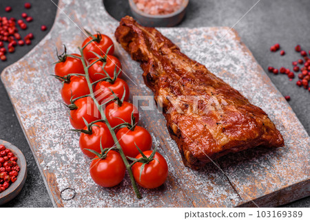 Delicious grilled or smoked pork ribs with salt, spices and herbs 103169389