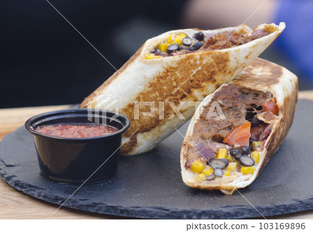 Street food. On a plate close up Street food. On a plate close up 103169896