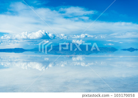 Uyuni Salt Flats. Altiplano, Bolivia. Rainy Season. Tunupa Volcano. Clouds Reflection on Water in 103170058