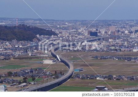 View from Mt. Monju towards the center of Fukui City Hokuriku Shinkansen under construction March 2023 103170128