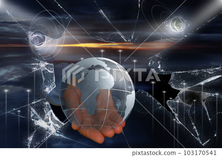 A look into space, infinity through broken glass. Earth globe in human hand through broken glass. Global network and data exchange in human hands A look into space, infinity through broken glass. Earth globe in human hand through broken glass. Global network and data exchange in human hands 103170541