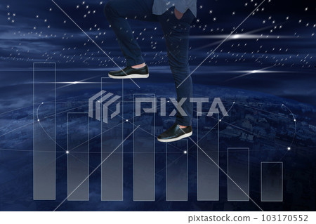 Man walking up a business growth chart. A man walking towards success against the backdrop of a night city with a starry sky 103170552