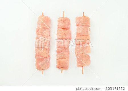 Skewers from raw chicken meat fillet on a white plate for supermarket on white background.Food for retail.Chicken skewers.Chicken breast Fillets Procurement for designers.Ogranic food,healthy eating Skewers from raw chicken meat fillet on a white plate for supermarket on white background.Food for retail.Chicken skewers.Chicken breast Fillets Procurement for designers.Ogranic food,healthy eating 103171552