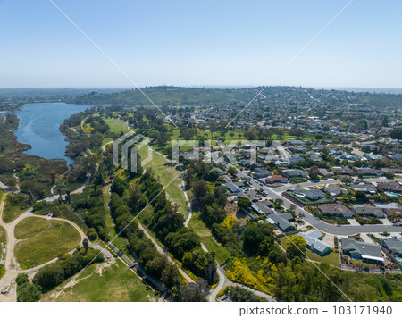 Aerial view of house around Lake Murray reservoir in San Diego, California 103171940