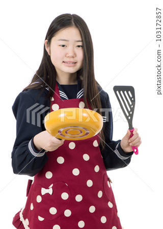 female student cooking 103172857