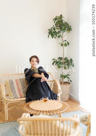 Photo of a woman drinking tea 103174239