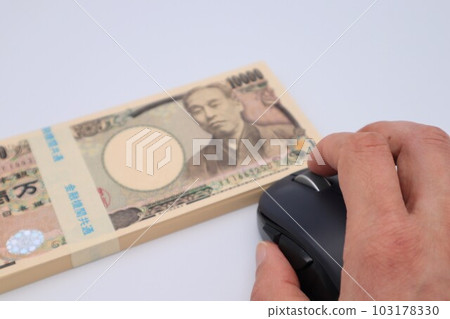The person who operates the mouse and the wad of bills The person who operates the mouse and the wad of bills 103178330