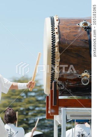 People playing big drums at a festival People playing big drums at a festival 103181065