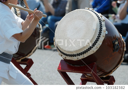 People playing big drums at a festival People playing big drums at a festival 103182382