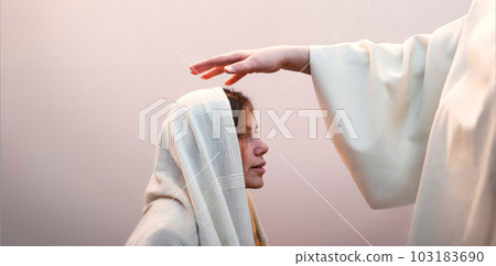 Blessing hand above the head of a woman in a headscarf Blessing hand above the head of a woman in a headscarf 103183690