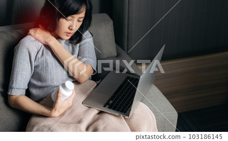 Asian woman has shoulder pain. Female holding painful shoulder with another hand. People with body-muscles problem, Healthcare And Medicine. 103186145