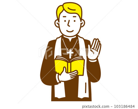 A male priest who raises his hand while holding a Bible 103186484