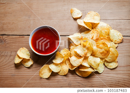 Corn sticks on wooden background Corn sticks on wooden background 103187483