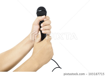 Human hand holding microphone 103187715