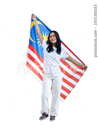 Asian women celebrate Malaysia independence day on 31 August by holding the Malaysia flag Asian women celebrate Malaysia independence day on 31 August by holding the Malaysia flag 103188383