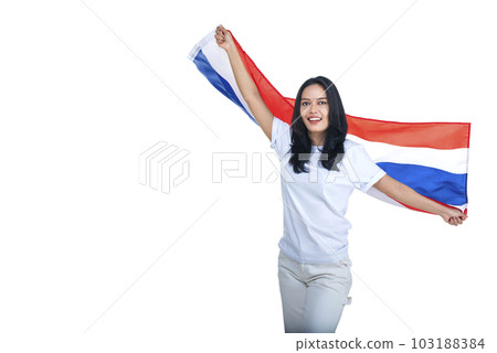Asian women celebrate Thailand's independence day on 05 December by holding the Thailand flag 103188384