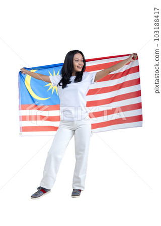 Asian women celebrate Malaysia independence day on 31 August by holding the Malaysia flag Asian women celebrate Malaysia independence day on 31 August by holding the Malaysia flag 103188417