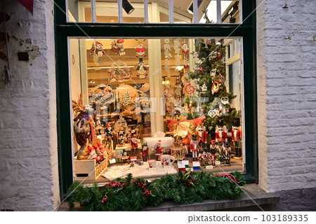 Shop window with Christmas display 103189335