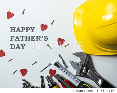 Construction tools, hard hat on white background with Happy Fathers day Construction tools, hard hat on white background with Happy Fathers day 103189416