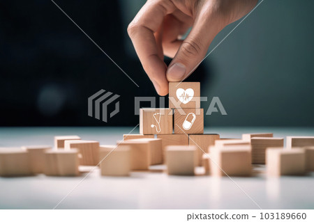 The future of medicine, wood blocks and male hands 103189660