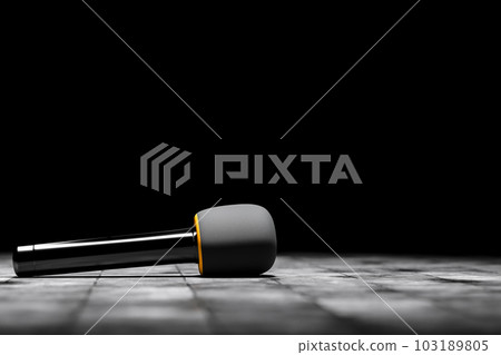 Microphone for an interview or reportage on floor on black background. Announcement, presentation of podcast or news Microphone for an interview or reportage on floor on black background. Announcement, presentation of podcast or news 103189805