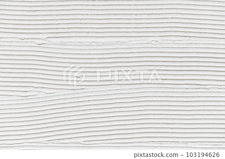 Wall surface with adhesive paste before laying a tile 103194626