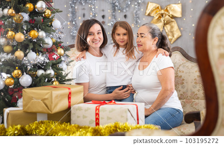 mom and grandma together with a little girl 103195272