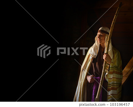 Ancient man with wooden wand Ancient man with wooden wand 103196457