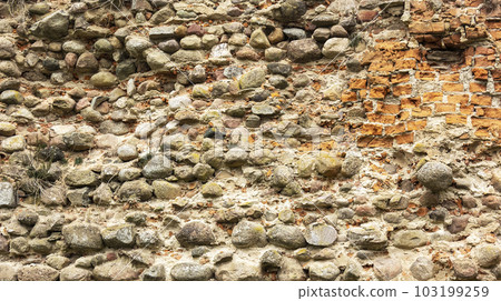 Old destroyed stone wall. Brickwork visible Belarus 103199259