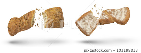 Two loaves of crispy bread isolated on white. Loaves of freshly baked crispy bread are broken in half with crumbs flying in all directions at the break. Top and bottom view. Fresh baking concept. Two loaves of crispy bread isolated on white. Loaves of freshly baked crispy bread are broken in half with crumbs flying in all directions at the break. Top and bottom view. Fresh baking concept. 103199818