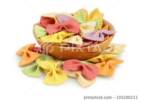colorful farfalle pasta in wooden bowl isolated on white background with full depth of field 103200211