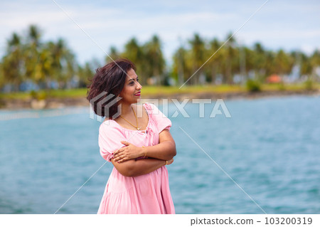 Young woman walking in yacht club Young woman walking in yacht club 103200319