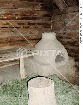 An example of an old utility room from the Middle Ages in an open-air museum in the Ukrainian city of Pereyaslav-Khmelnitsky. The interior of a medieval utility room. An example of an old utility room from the Middle Ages in an open-air museum in the Ukrainian city of Pereyaslav-Khmelnitsky. The interior of a medieval utility room. 103200415
