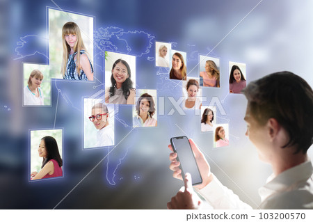 Man looking at dating app profile on mobile phone 103200570