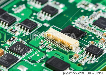 Close-up of computer chips on a part of electronic printed circuit board Close-up of computer chips on a part of electronic printed circuit board 103200951