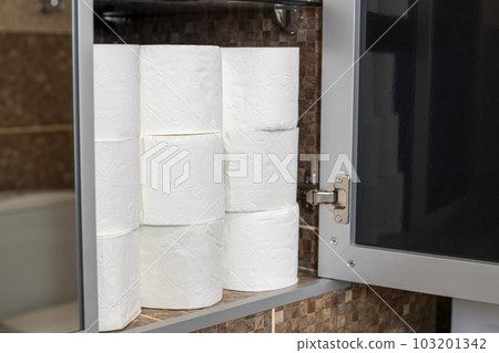 A locker full of toilet paper. A huge pile of toilet paper 103201342