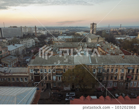 The courtyard between the Odessa Soviet built apartment blocks evening day.  103202868