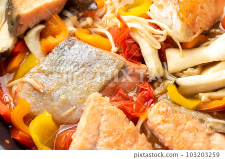 Stir-fried salmon and mushrooms with butter ponzu sauce. 103203259