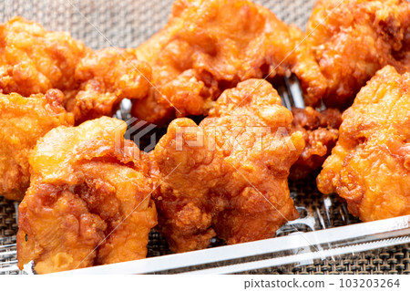 Takeout image. Deep-fried chicken in a clear plastic container. Takeout image. Deep-fried chicken in a clear plastic container. 103203264