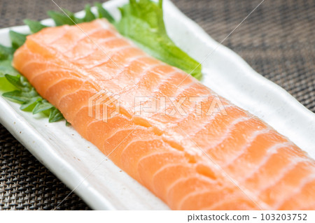 Close-up of raw salmon for sashimi. 103203752