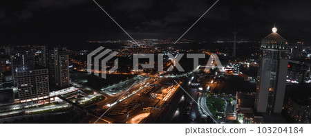 Aerial view of the Istambul business district. Rapidly developing business and finance area of Istanbul with highrises and shopping malls. Commercial buildings at night Aerial view of the Istambul business district. Rapidly developing business and finance area of Istanbul with highrises and shopping malls. Commercial buildings at night 103204184